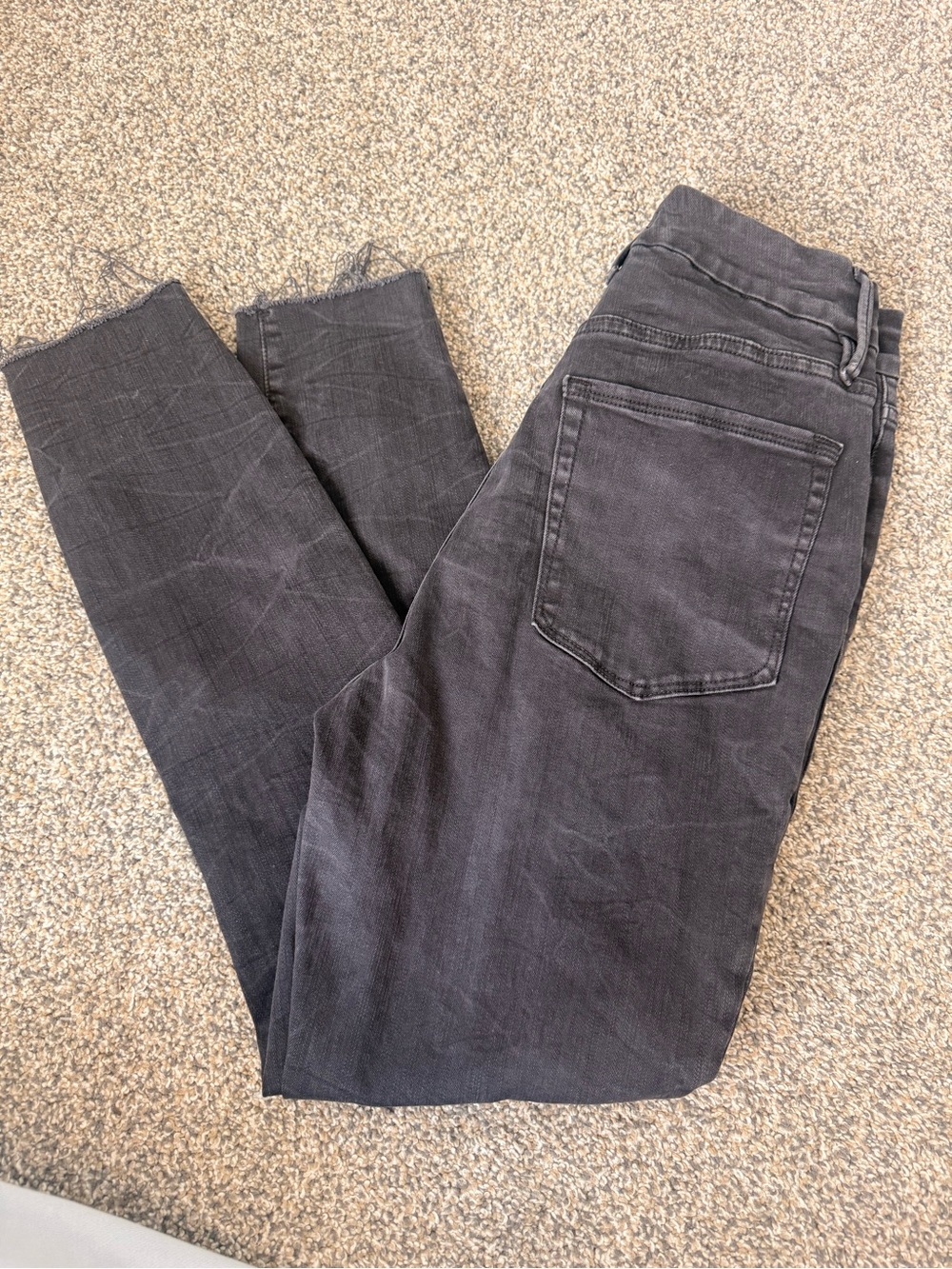 Good American Black Skinny Jeans with Raw Hem